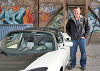 Jaff Stevenson with 2010 Tesla Roadster Sport at EV Fest 2011