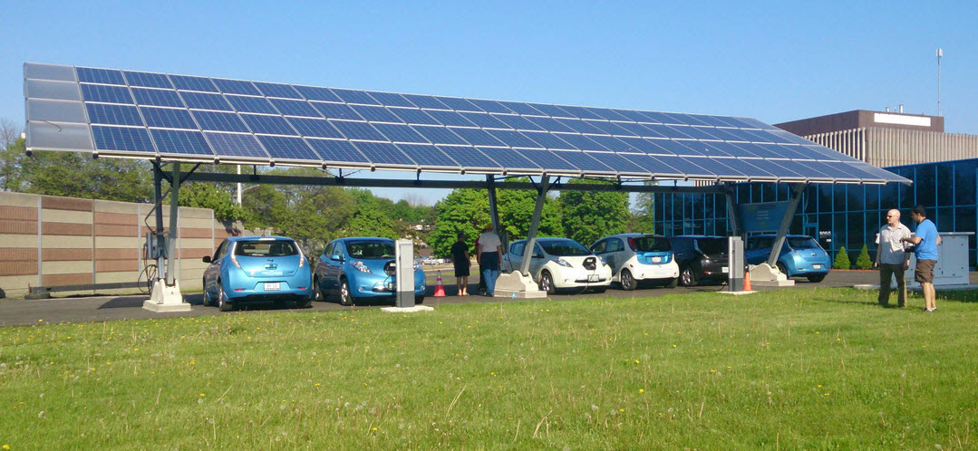 Photo of Baka Mobiles Solar Carport and EV's Charging from Fence by Highway 427