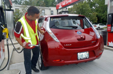 Our Frustrated Gas Attendant - Can't figure out - There is NO GAS Needed here, in this new Nissan LEAF!